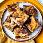 Fudgy Swirled Pumpkin Cheesecake Brownies